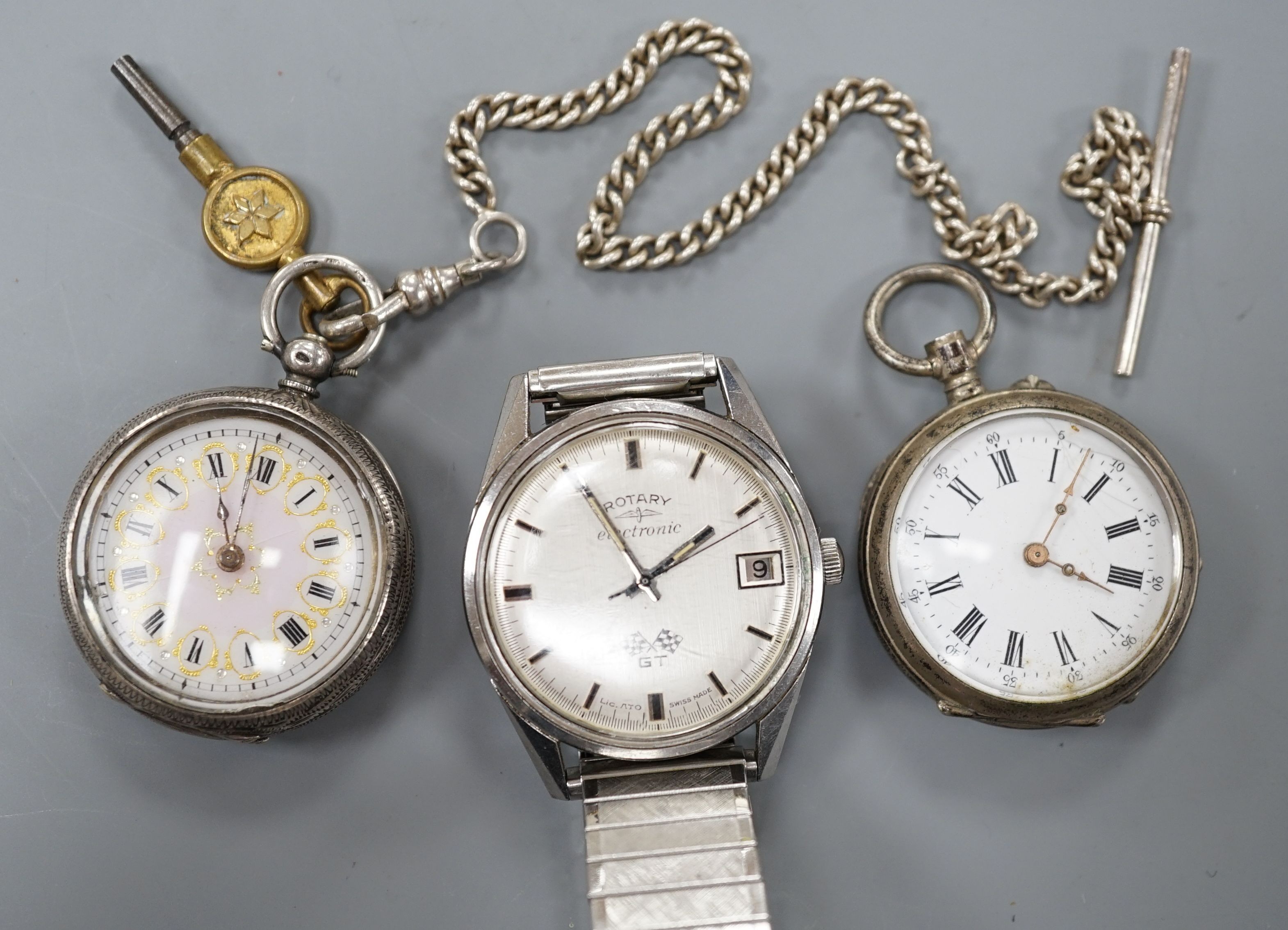 A gentleman's steel Rotary Electronic GT wrist watch and two Swiss white metal fob watches